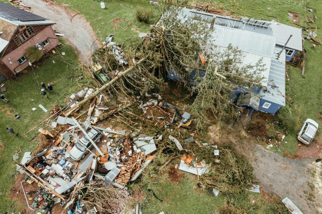Rental apartment exterior storm damage — illustration of wind or hail damage scenario covered under renters insurance for personal belongings